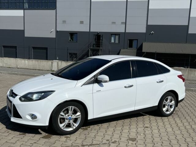 Белый Форд Фокус, объемом двигателя 1.6 л и пробегом 180 тыс. км за 7000 $, фото 1 на Automoto.ua