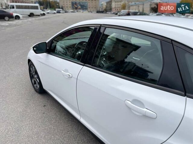 Белый Форд Фокус, объемом двигателя 2 л и пробегом 115 тыс. км за 7700 $, фото 7 на Automoto.ua
