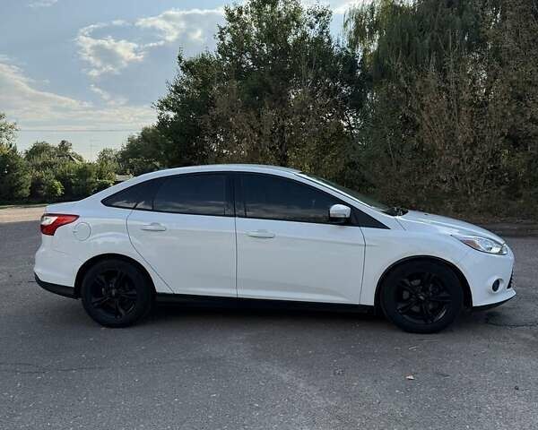 Белый Форд Фокус, объемом двигателя 2 л и пробегом 304 тыс. км за 7599 $, фото 1 на Automoto.ua