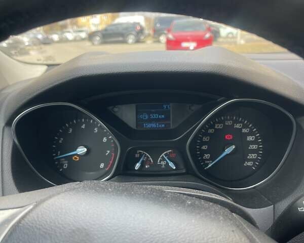 Белый Форд Фокус, объемом двигателя 1 л и пробегом 159 тыс. км за 6500 $, фото 10 на Automoto.ua