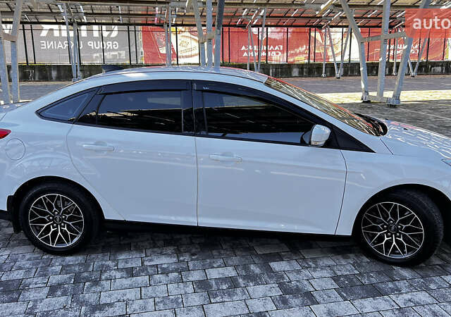 Білий Форд Фокус, об'ємом двигуна 1 л та пробігом 131 тис. км за 8500 $, фото 3 на Automoto.ua
