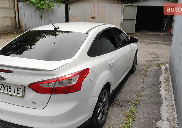 Білий Форд Фокус, об'ємом двигуна 2 л та пробігом 139 тис. км за 7500 $, фото 3 на Automoto.ua