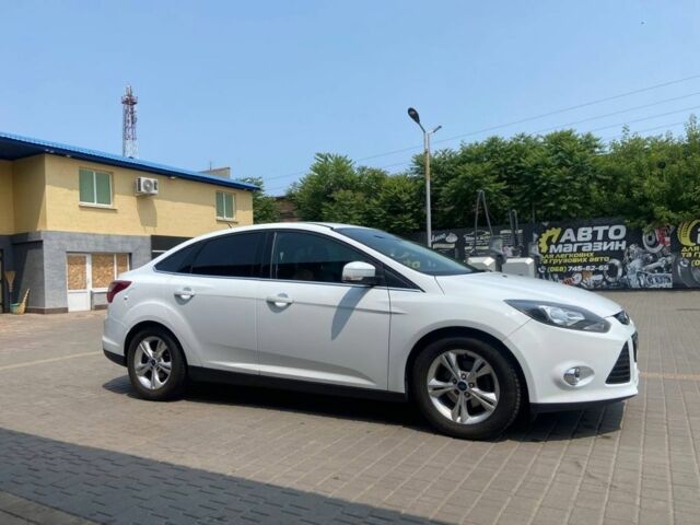 Белый Форд Фокус, объемом двигателя 1 л и пробегом 152 тыс. км за 6000 $, фото 1 на Automoto.ua