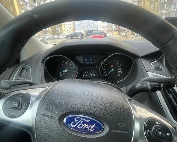 Белый Форд Фокус, объемом двигателя 1 л и пробегом 159 тыс. км за 6500 $, фото 11 на Automoto.ua