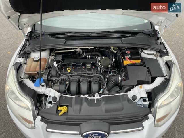 Белый Форд Фокус, объемом двигателя 2 л и пробегом 115 тыс. км за 7700 $, фото 18 на Automoto.ua