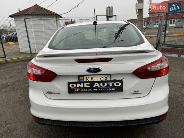 Белый Форд Фокус, объемом двигателя 2 л и пробегом 215 тыс. км за 9490 $, фото 7 на Automoto.ua