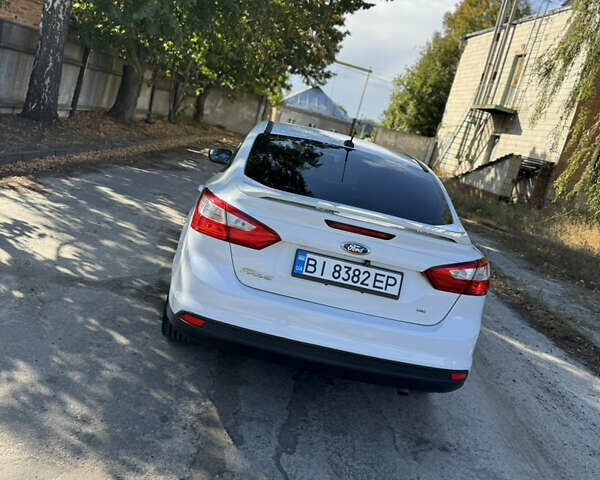 Білий Форд Фокус, об'ємом двигуна 2 л та пробігом 54 тис. км за 8500 $, фото 23 на Automoto.ua