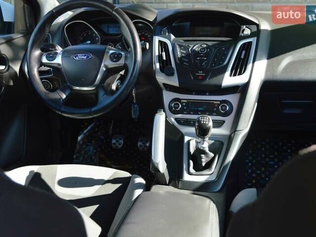 Белый Форд Фокус, объемом двигателя 1 л и пробегом 234 тыс. км за 5950 $, фото 30 на Automoto.ua