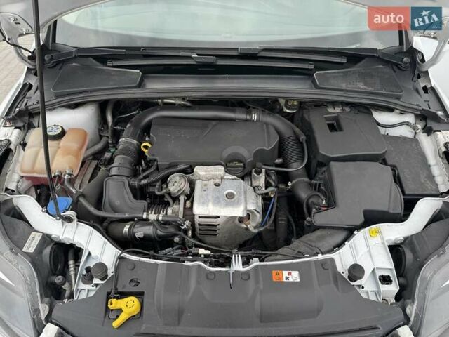 Форд Фокус 2014 в Новоукраинке на Automoto.ua Белый Форд Фокус, объемом двигателя 1 л и пробегом 141 тыс. км за 6800 $, фото 26 на Automoto.ua