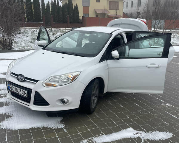 Білий Форд Фокус, об'ємом двигуна 2 л та пробігом 124 тис. км за 7700 $, фото 15 на Automoto.ua
