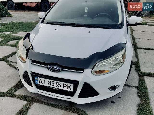 Білий Форд Фокус, об'ємом двигуна 2 л та пробігом 223 тис. км за 6999 $, фото 1 на Automoto.ua