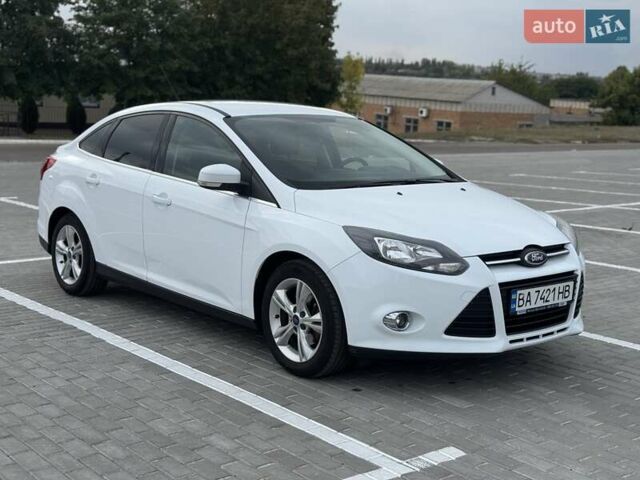 Форд Фокус 2014 в Новоукраинке на Automoto.ua Белый Форд Фокус, объемом двигателя 1 л и пробегом 141 тыс. км за 6800 $, фото 6 на Automoto.ua