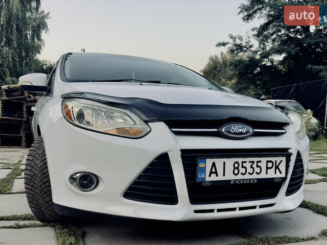 Білий Форд Фокус, об'ємом двигуна 2 л та пробігом 223 тис. км за 6999 $, фото 2 на Automoto.ua