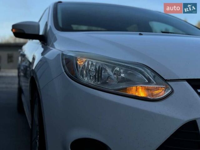 Білий Форд Фокус, об'ємом двигуна 2 л та пробігом 269 тис. км за 7300 $, фото 12 на Automoto.ua