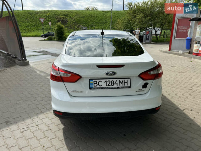 Білий Форд Фокус, об'ємом двигуна 2.01 л та пробігом 256 тис. км за 7000 $, фото 4 на Automoto.ua