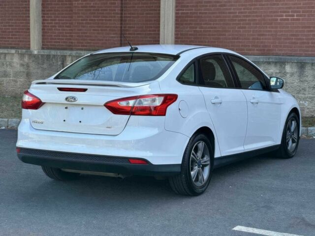 Форд Фокус 2014 в Ивано-Франковске на Automoto.ua Белый Форд Фокус, объемом двигателя 2 л и пробегом 87 тыс. км за 6000 $, фото 5 на Automoto.ua