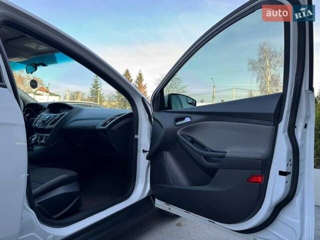 Білий Форд Фокус, об'ємом двигуна 2 л та пробігом 269 тис. км за 7300 $, фото 56 на Automoto.ua