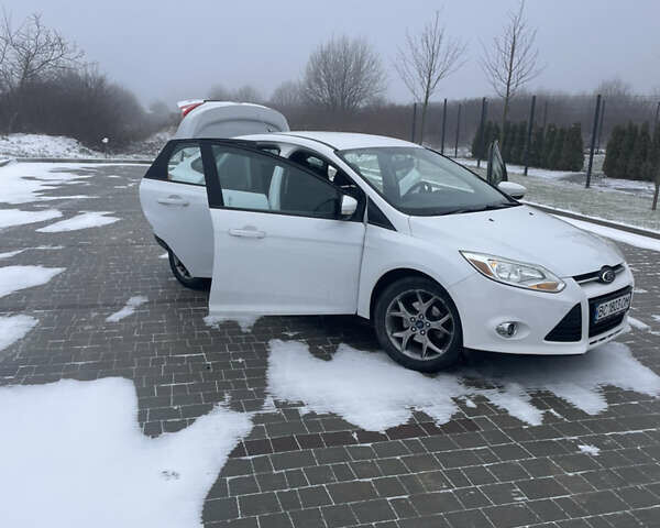 Білий Форд Фокус, об'ємом двигуна 2 л та пробігом 124 тис. км за 7700 $, фото 9 на Automoto.ua