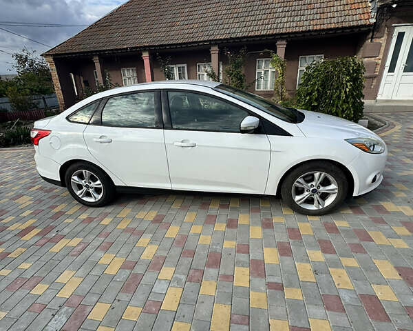 Белый Форд Фокус, объемом двигателя 2 л и пробегом 220 тыс. км за 6500 $, фото 1 на Automoto.ua