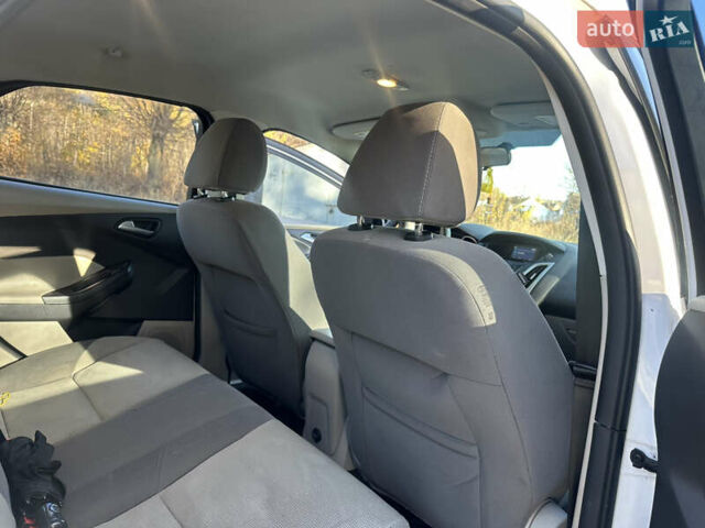 Білий Форд Фокус, об'ємом двигуна 2 л та пробігом 177 тис. км за 6300 $, фото 18 на Automoto.ua