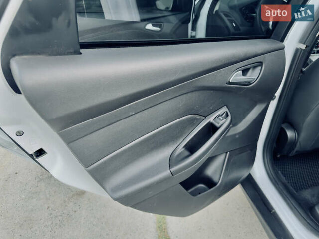 Білий Форд Фокус, об'ємом двигуна 2 л та пробігом 223 тис. км за 6999 $, фото 11 на Automoto.ua