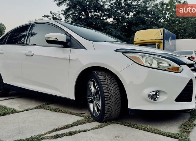 Білий Форд Фокус, об'ємом двигуна 2 л та пробігом 223 тис. км за 6999 $, фото 4 на Automoto.ua