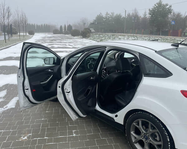 Білий Форд Фокус, об'ємом двигуна 2 л та пробігом 124 тис. км за 7700 $, фото 14 на Automoto.ua