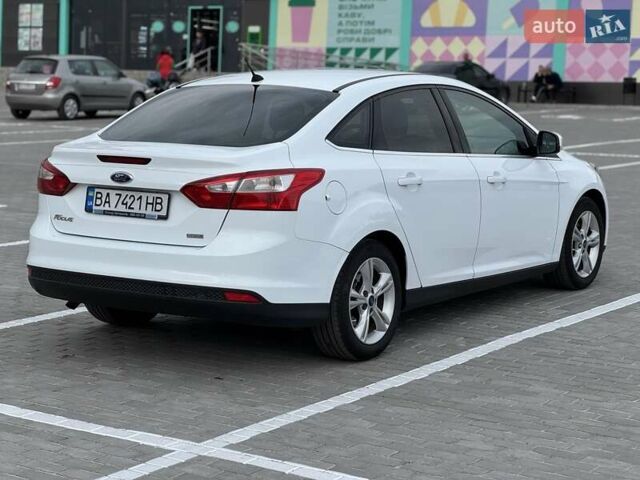 Форд Фокус 2014 в Новоукраинке на Automoto.ua Белый Форд Фокус, объемом двигателя 1 л и пробегом 141 тыс. км за 6800 $, фото 4 на Automoto.ua