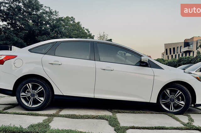 Білий Форд Фокус, об'ємом двигуна 2 л та пробігом 223 тис. км за 6999 $, фото 5 на Automoto.ua