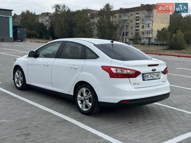 Форд Фокус 2014 в Новоукраинке на Automoto.ua Белый Форд Фокус, объемом двигателя 1 л и пробегом 141 тыс. км за 6800 $, фото 2 на Automoto.ua