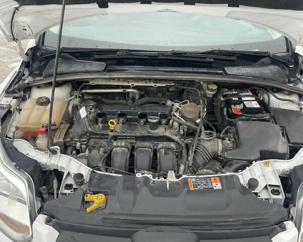 Білий Форд Фокус, об'ємом двигуна 2 л та пробігом 124 тис. км за 7700 $, фото 27 на Automoto.ua