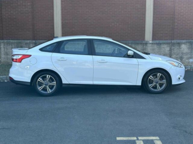 Форд Фокус 2014 в Ивано-Франковске на Automoto.ua Белый Форд Фокус, объемом двигателя 2 л и пробегом 87 тыс. км за 6000 $, фото 6 на Automoto.ua