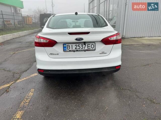 Білий Форд Фокус, об'ємом двигуна 2 л та пробігом 162 тис. км за 8000 $, фото 4 на Automoto.ua