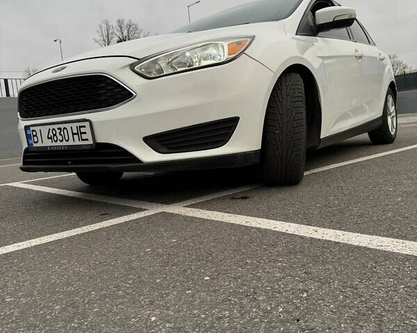 Белый Форд Фокус, объемом двигателя 2 л и пробегом 205 тыс. км за 8300 $, фото 12 на Automoto.ua