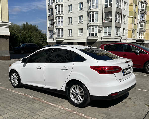Белый Форд Фокус, объемом двигателя 2 л и пробегом 195 тыс. км за 8222 $, фото 12 на Automoto.ua