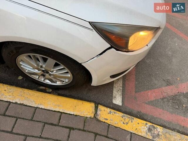 Білий Форд Фокус, об'ємом двигуна 2 л та пробігом 180 тис. км за 7850 $, фото 9 на Automoto.ua