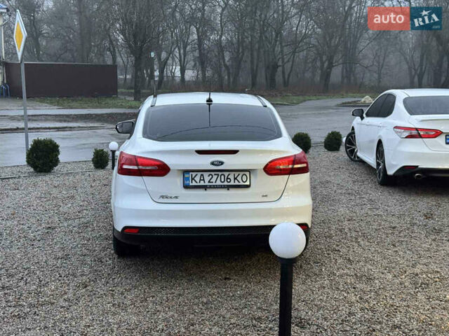 Белый Форд Фокус, объемом двигателя 2 л и пробегом 223 тыс. км за 8000 $, фото 3 на Automoto.ua