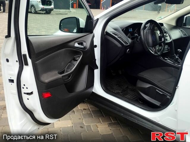 Білий Форд Фокус, об'ємом двигуна 1.6 л та пробігом 163 тис. км за 8699 $, фото 7 на Automoto.ua