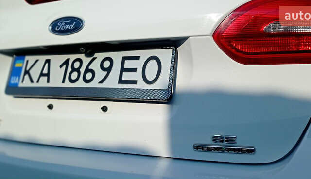 Білий Форд Фокус, об'ємом двигуна 2 л та пробігом 195 тис. км за 8999 $, фото 8 на Automoto.ua