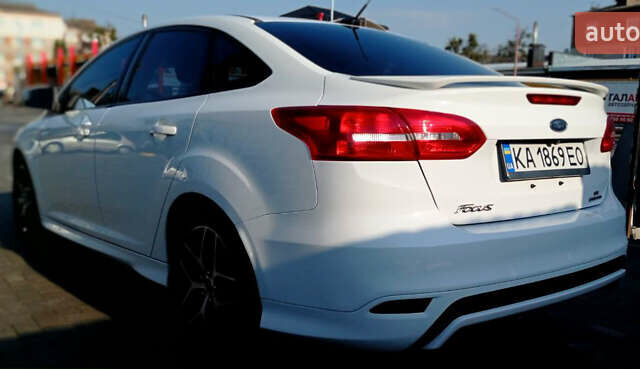 Білий Форд Фокус, об'ємом двигуна 2 л та пробігом 195 тис. км за 8999 $, фото 6 на Automoto.ua