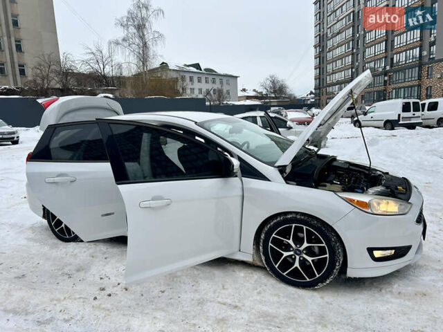 Білий Форд Фокус, об'ємом двигуна 2 л та пробігом 147 тис. км за 7950 $, фото 31 на Automoto.ua