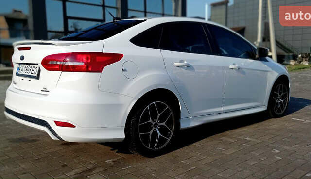 Білий Форд Фокус, об'ємом двигуна 2 л та пробігом 195 тис. км за 8999 $, фото 5 на Automoto.ua