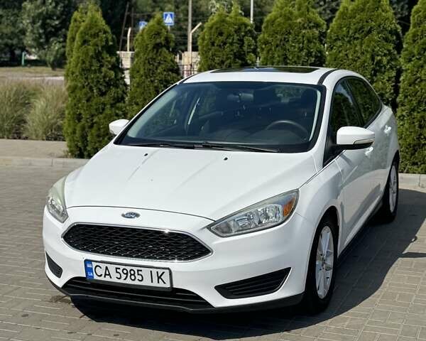 Білий Форд Фокус, об'ємом двигуна 2 л та пробігом 218 тис. км за 8500 $, фото 1 на Automoto.ua