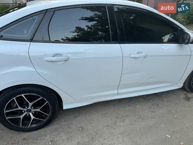Белый Форд Фокус, объемом двигателя 2 л и пробегом 125 тыс. км за 8900 $, фото 15 на Automoto.ua