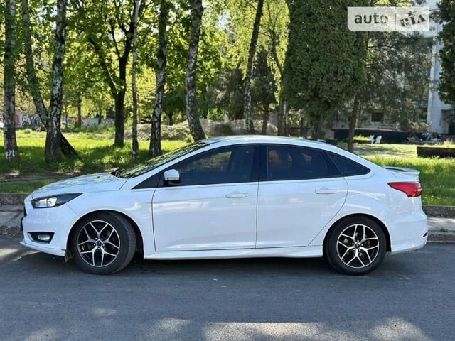 Білий Форд Фокус, об'ємом двигуна 2 л та пробігом 236 тис. км за 8400 $, фото 4 на Automoto.ua
