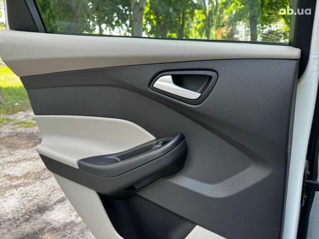 Белый Форд Фокус, объемом двигателя 2 л и пробегом 77 тыс. км за 9190 $, фото 22 на Automoto.ua