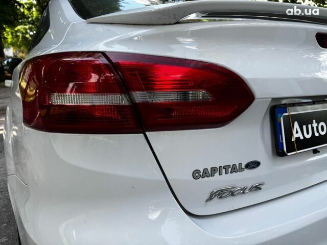 Белый Форд Фокус, объемом двигателя 2 л и пробегом 77 тыс. км за 9190 $, фото 7 на Automoto.ua