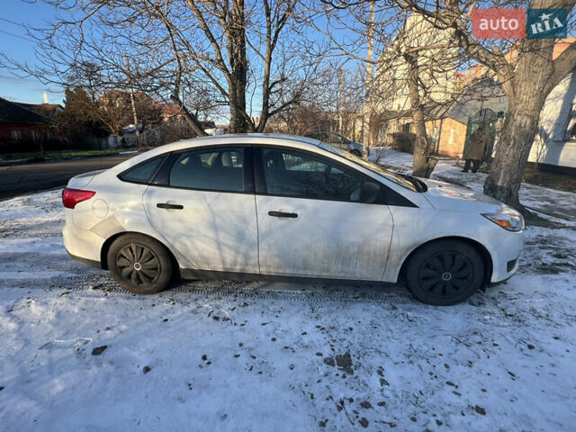 Білий Форд Фокус, об'ємом двигуна 2 л та пробігом 142 тис. км за 8800 $, фото 1 на Automoto.ua