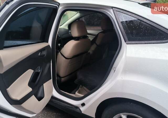 Белый Форд Фокус, объемом двигателя 2 л и пробегом 136 тыс. км за 9200 $, фото 2 на Automoto.ua