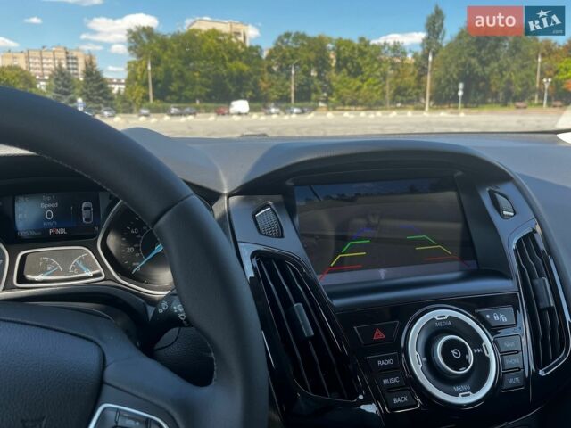 Білий Форд Фокус, об'ємом двигуна 2 л та пробігом 133 тис. км за 8700 $, фото 19 на Automoto.ua